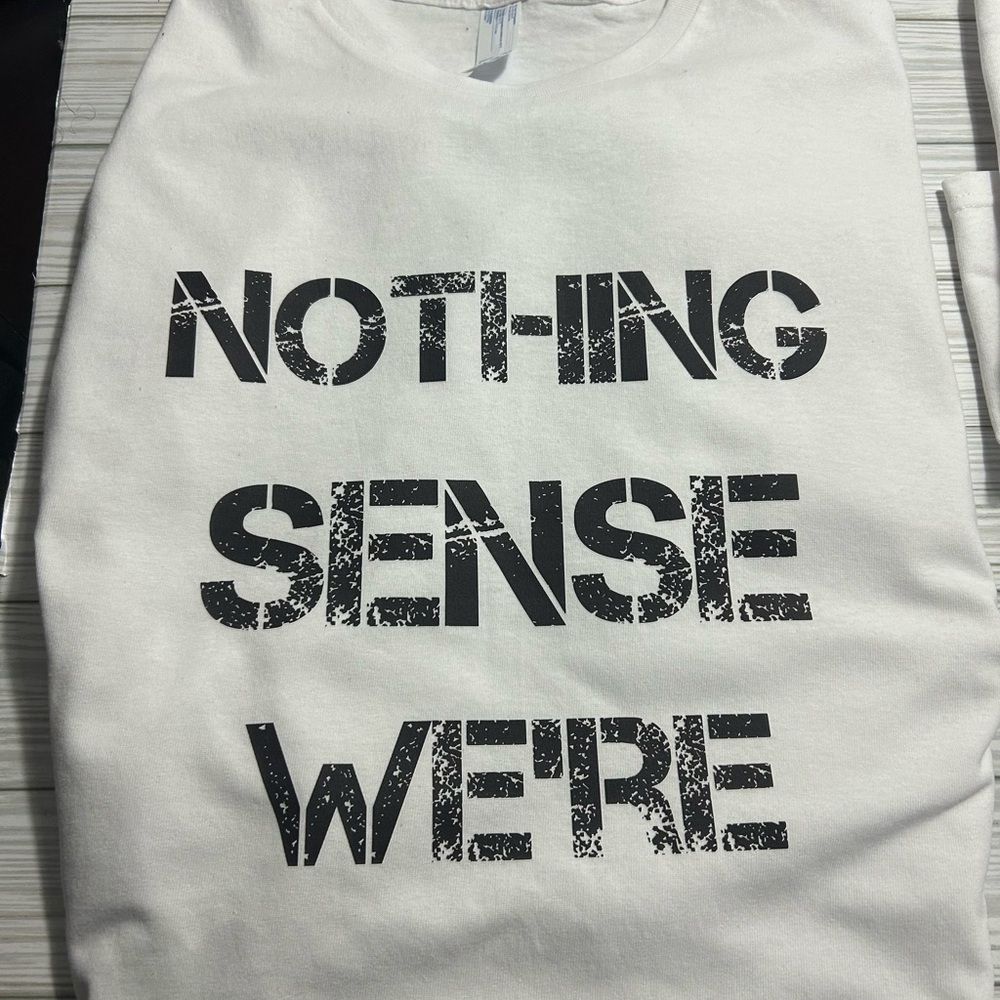 White Graphic Tee with Bold Text